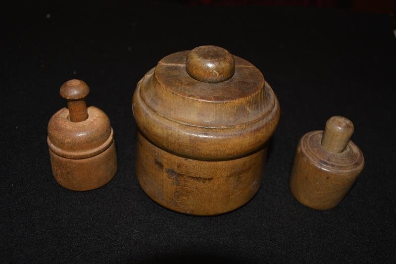 Butter Molds: (3) Antique butter molds, large has grain pattern, medium has 6 pointed star, small has leaves and flower