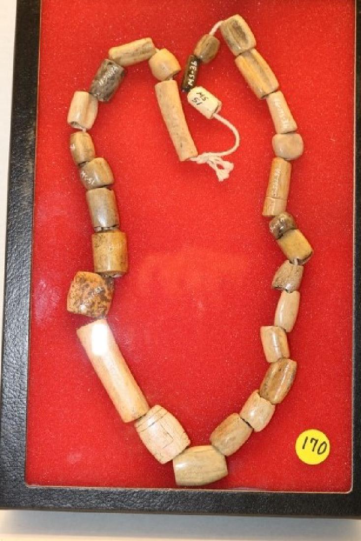 strand of cut deer leg bone beads: Fine 24” long strand of cut deer leg bone beads all found in Jim Turley in Mason Co., West Virginia