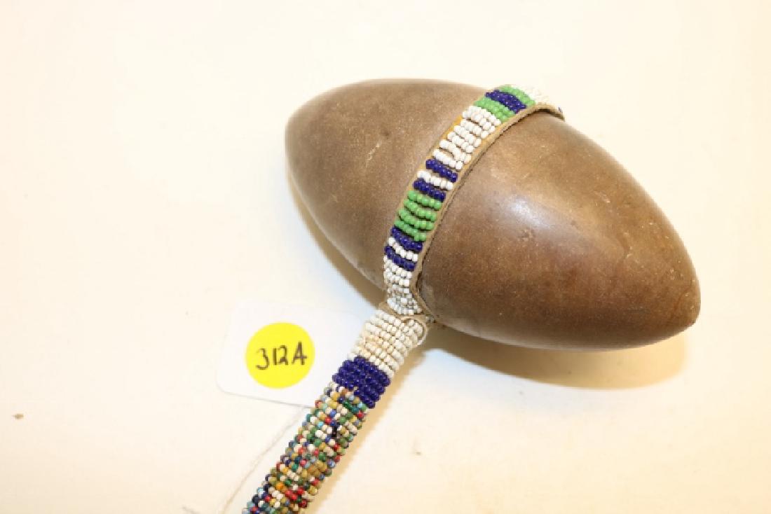 stone head beaded club (1 of 2)