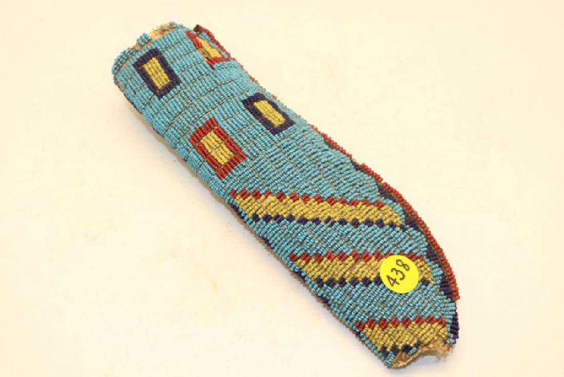 438. 9” x 2 ¾” beaded sheath made from old moccasin (1 of 3)