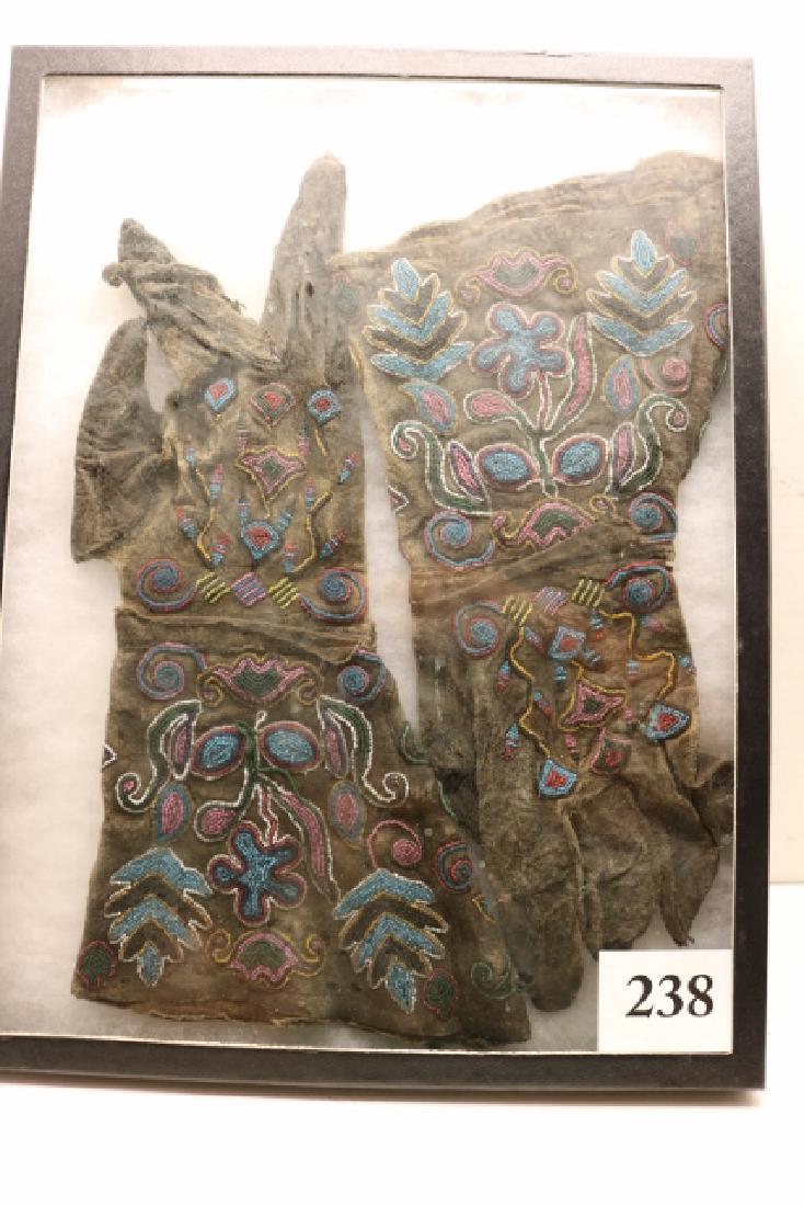 Pair of Sioux Beaded Guantlets: 6” x 13 ½” Pair of Sioux Beaded Guantlets –circa 1880, seed beaded, beautifully done - very stiff, holes