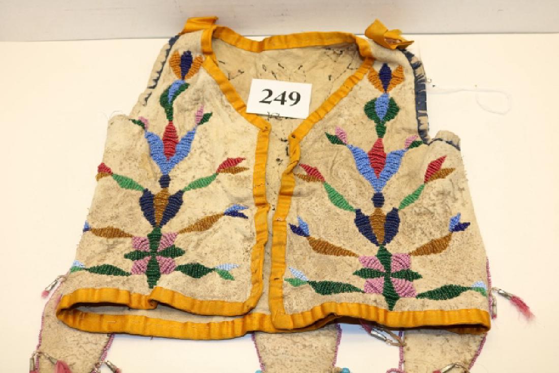 Childs Beaded Front-Back Vest: 10” x 14” plus drops, a Real Jewel, Childs Beaded Front-Back Vest with 3 fetish pouches with tin cones, museum quality
