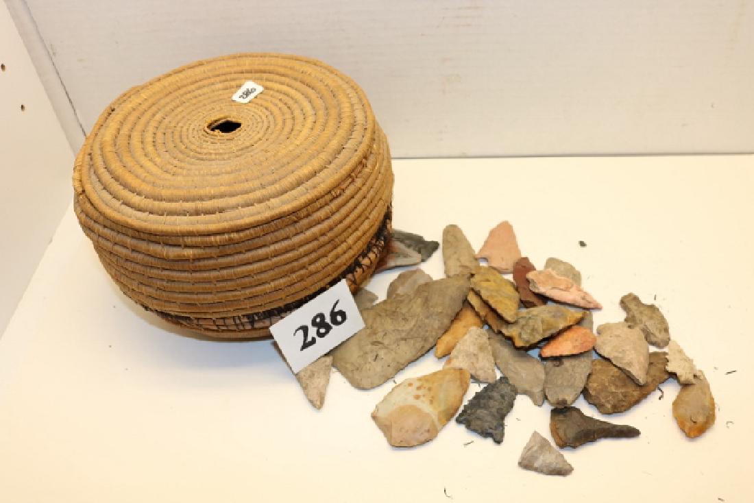 Lidded basket / 27 Flint Points: 7” x 4 ½” damaged Lidded basket with 27 Flint Points and Shark Teeth