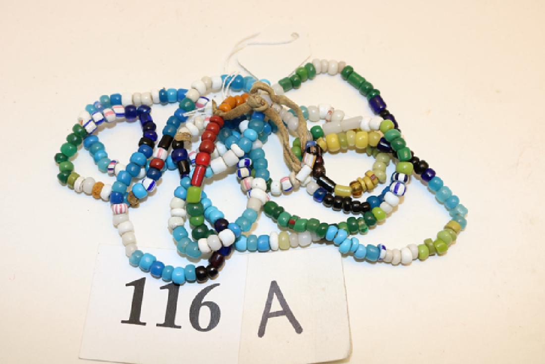 Strand of Multi Colored Trade Beads: Strand of Multi Colored Trade Beads, 3 5/8” Ex. Frank Pike Coll.