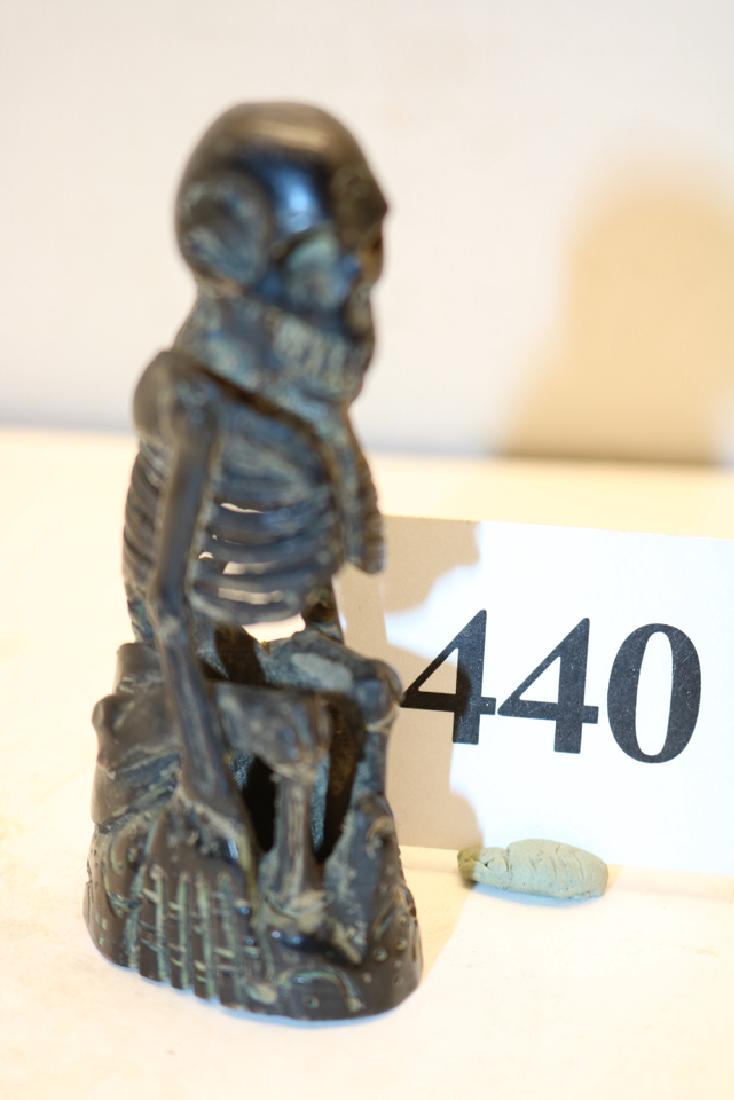 Carved Antler Sitting Skeleton (1 of 1)