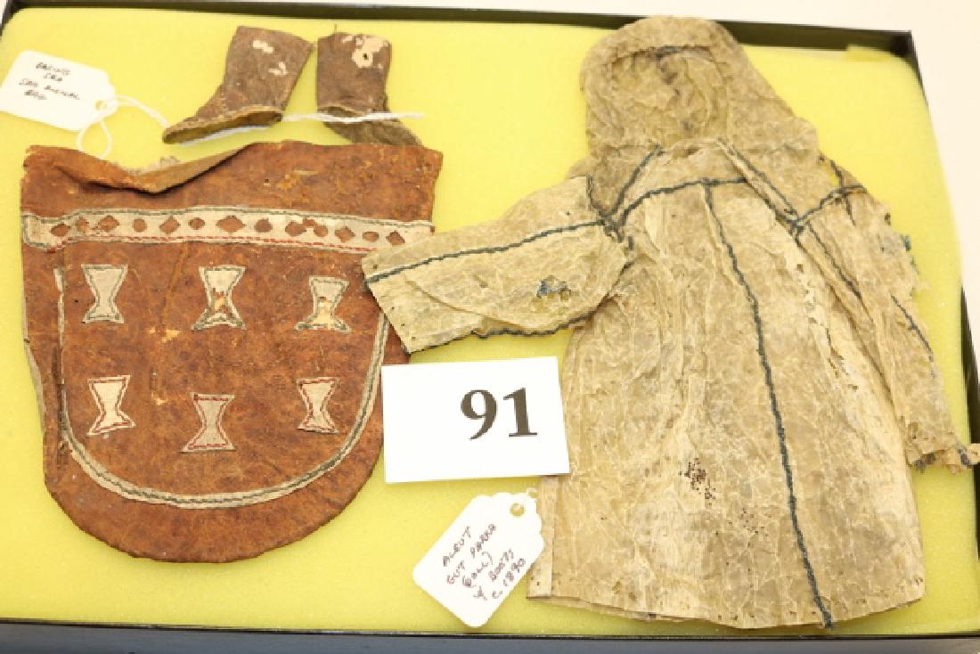 North West Coast Doll Clothes: 8 x 12 Frame containing North West Coast Doll Clothes, boots, parka etc….