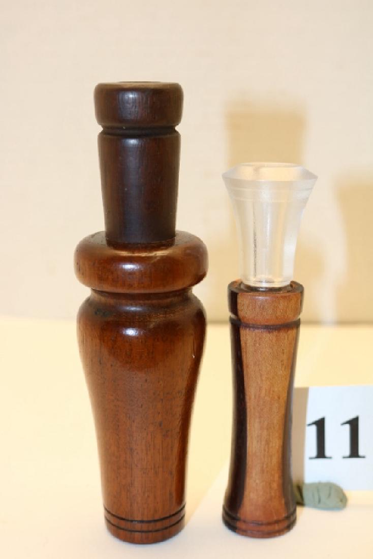 Lot of two Duck calls: Lot of two Duck calls by Unknown Makers: 1)5 1/2" cedar barrel duck call with walnut stopper/tone board, single plastic reed. Obviously made by an accomplished call maker, super tone, loud and easy to