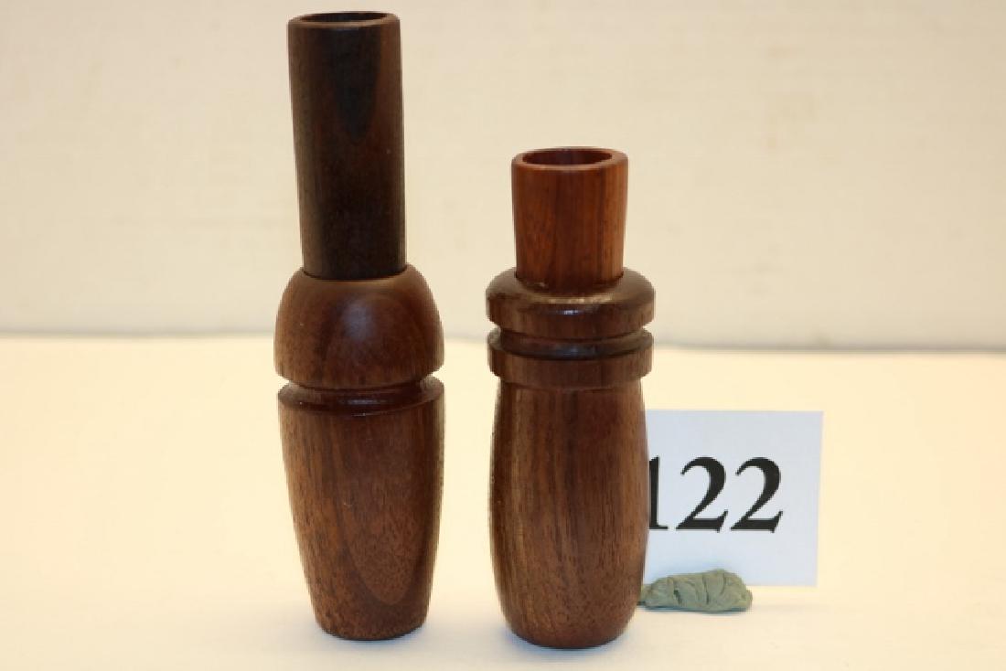 handmade wildfowl calls, duck and goose: Two very fine handmade wildfowl calls, duck and goose, by unknown makers: 1) 4 3/4" walnut barrel/stopper goose call, attributed to Ken Martin. Features include a 2 piece inserted tone board with wood