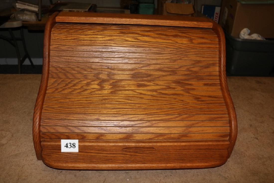 Fly tying counter desk: Unique Fly tying counter desk, solid oak constructed, roll-top cabinet measuring 24 1/2"W x 18"D x 14"H. This fly tying cabinet appears little used, roll top stick just a bit but probably from being s