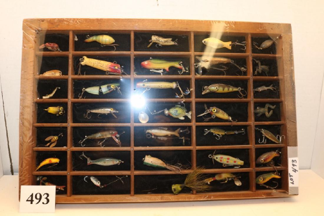 lot of Fly Rod and Pan fishTrout lures: Framed lot of Fly Rod and Pan fishTrout lures from various makers. This lot includes 35 different examples of lures, several pre-1920's through 1970's. Various conditions from fair to minty. The small