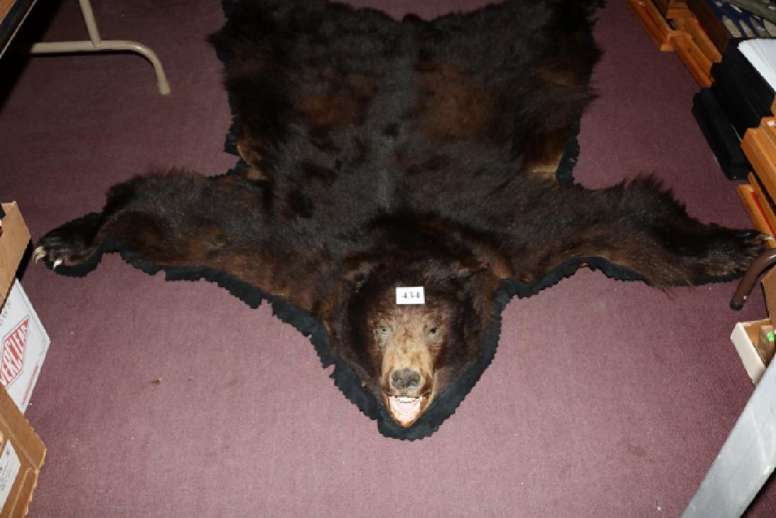 Bear Hide Rug with claws (1 of 2)