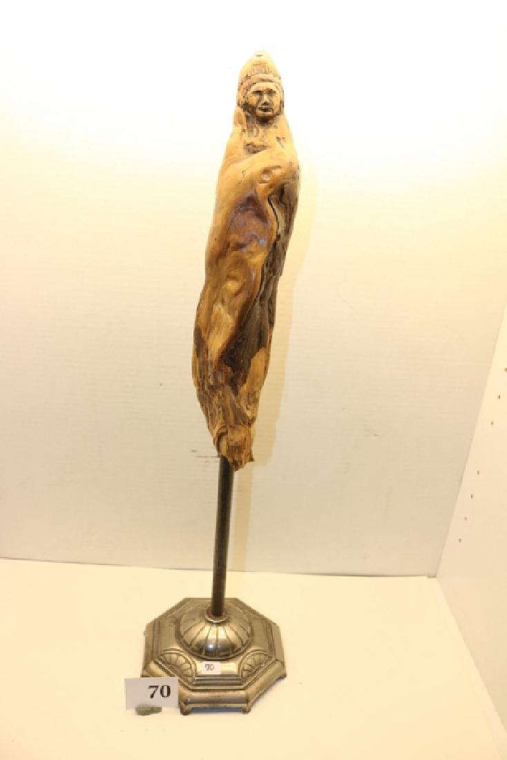 Carved Wood Indian Sculpture: 21" x 6 1/4" Carved Wood Indian Sculpture on Nickel Plated Base signed Bruce Stowe