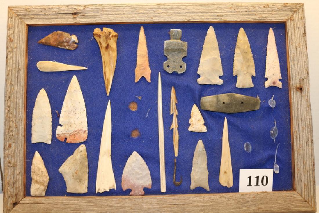 21 Assorted Artifacts: 12 x 18 Frame with 21 Assorted Artifacts, some age uncertain, Points, Pipe, Bone Awls, Bone Fish Hook, Gorget, Harpoon, Coronation Knife