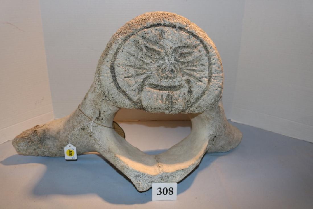 Prehistoric Whale Bone VertebraeNO SHIPPING OUT OF COUN: Prehistoric Whale Bone Vertebrae, Clyde River, North Coast, of Baffin Island with tattoo face design no shipping out of country
