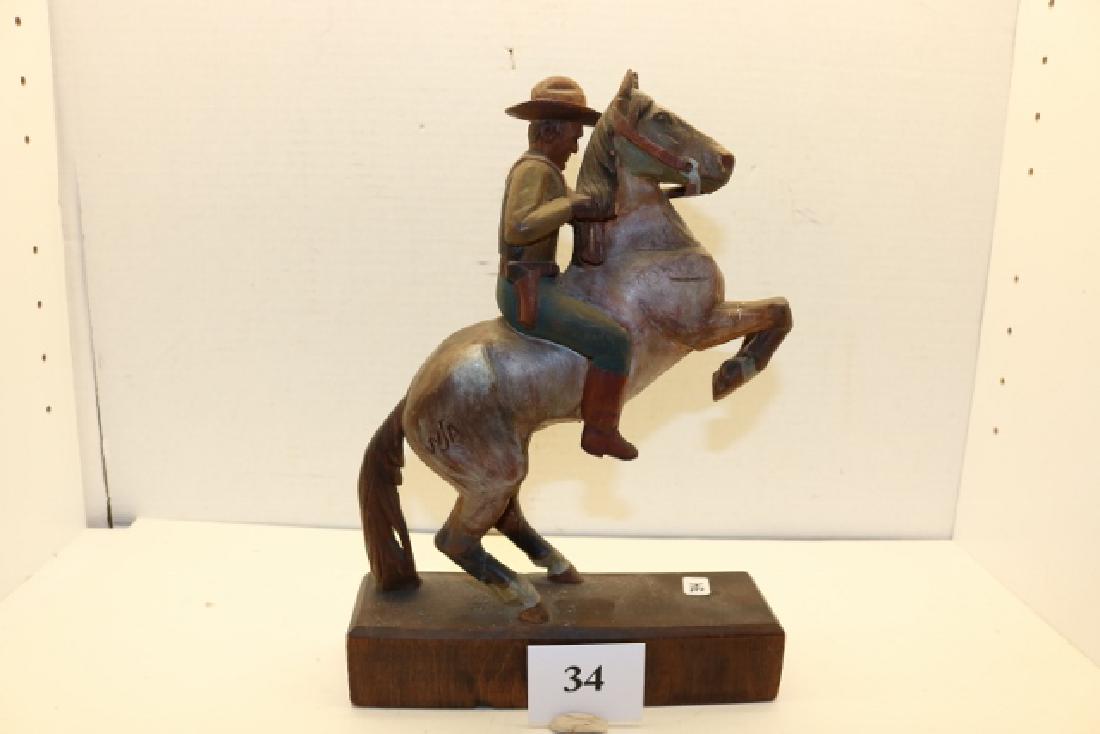 Wood Hand Carved Bucking Bronco with rider: 8” x 2 ½” x 11” Wood Hand Carved Bucking Bronco with rider – missing piece from bridle