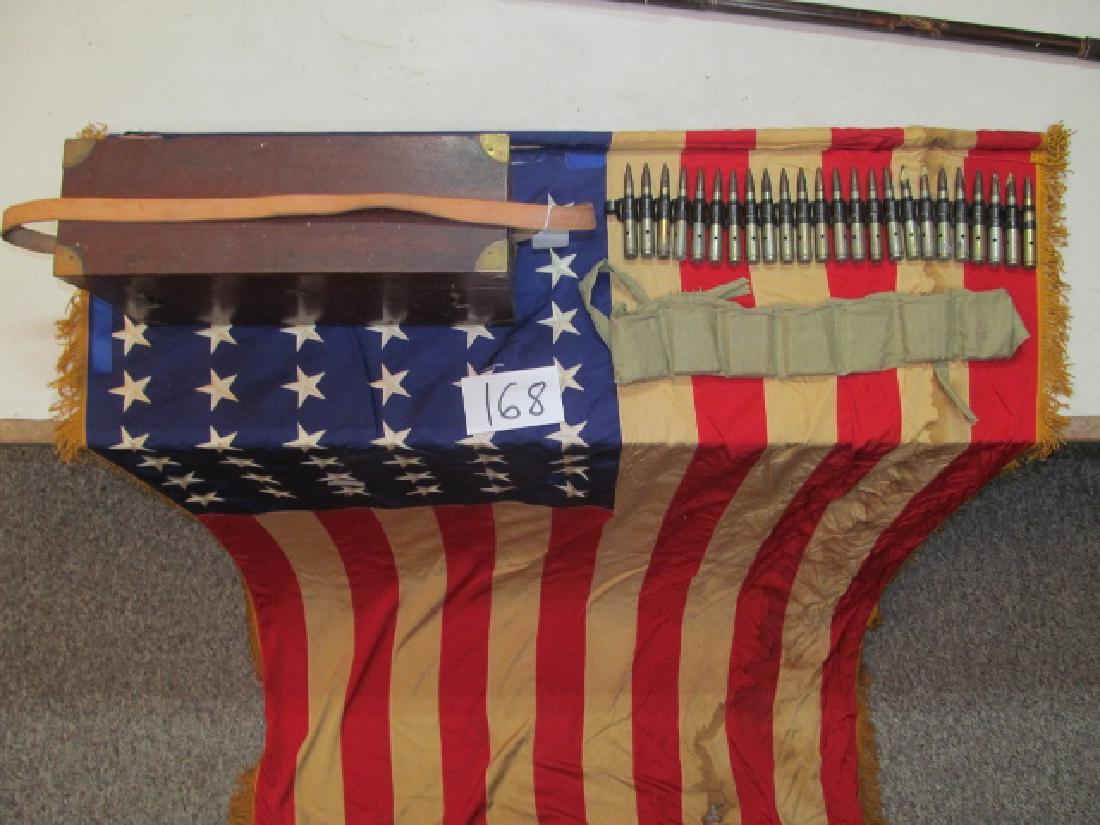 Job Lot: 48 Star American Flag: Job Lot: 48 Star American Flag, Heavy Damage, aprox. 68” x 52”, an early dovetail wooden surveyor instrument box with brass corners, replacement strap, also a row of 50 caliber machine gun