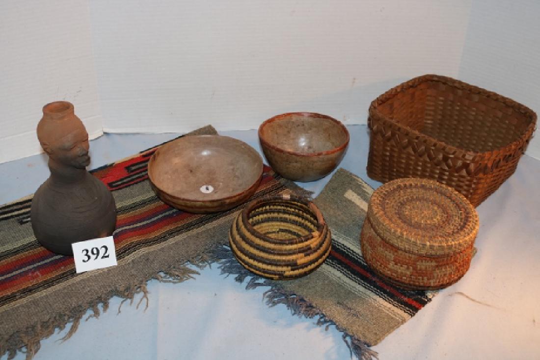 2 Mexican Painted Pottery Bowls: 2 Mexican Painted Pottery Bowls, 7 ½” African Effigy Bottle, 3 assorted baskets, 2 Mexican Woven Mats