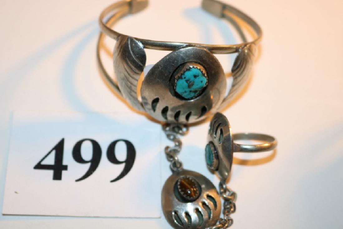 Bracelet with bear paw design: 2” Bracelet with bear paw design – turq. Inset with chain and ring signed