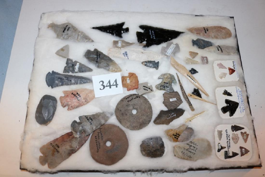 Frame with 45 Assorted Flint: Frame with 45 Assorted Flint, Obsidian Points, 2 Stone Discs, 4 Bone Awls, there are some damaged items