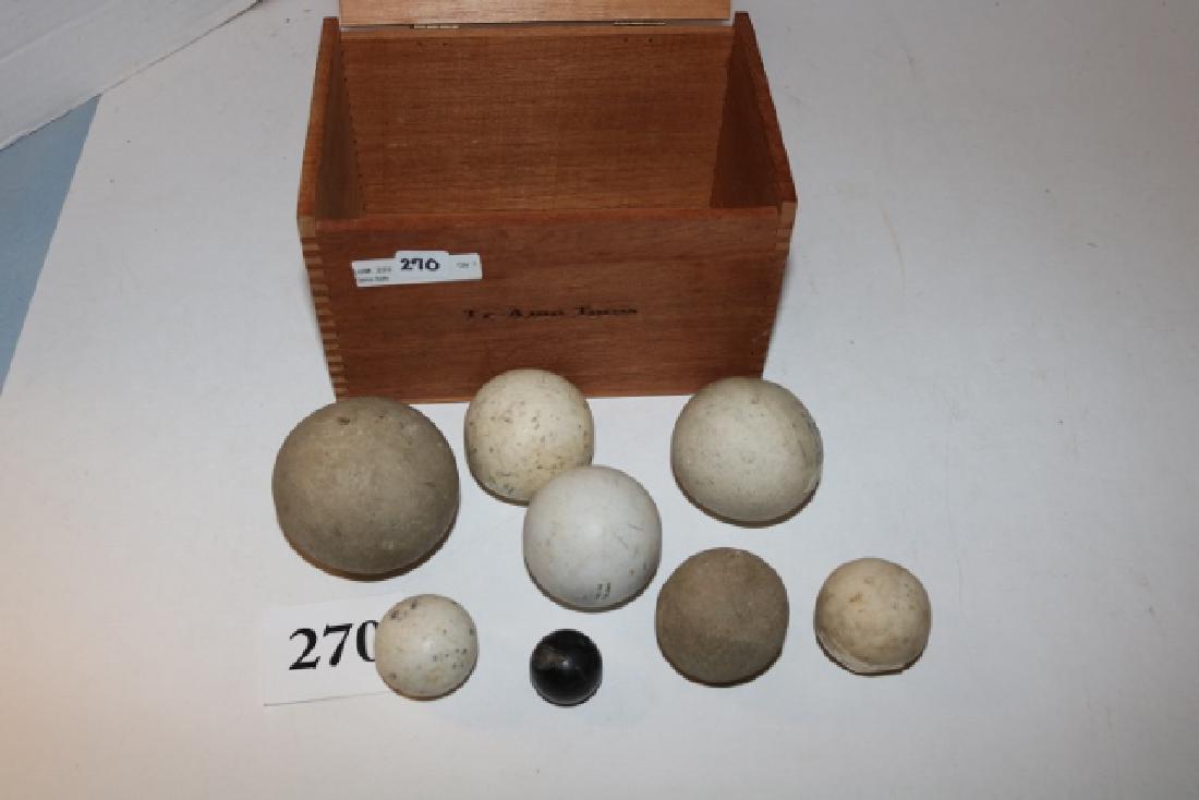 8 Game Balls: 8 Game Balls in wood cigar box, largest 2 ½”