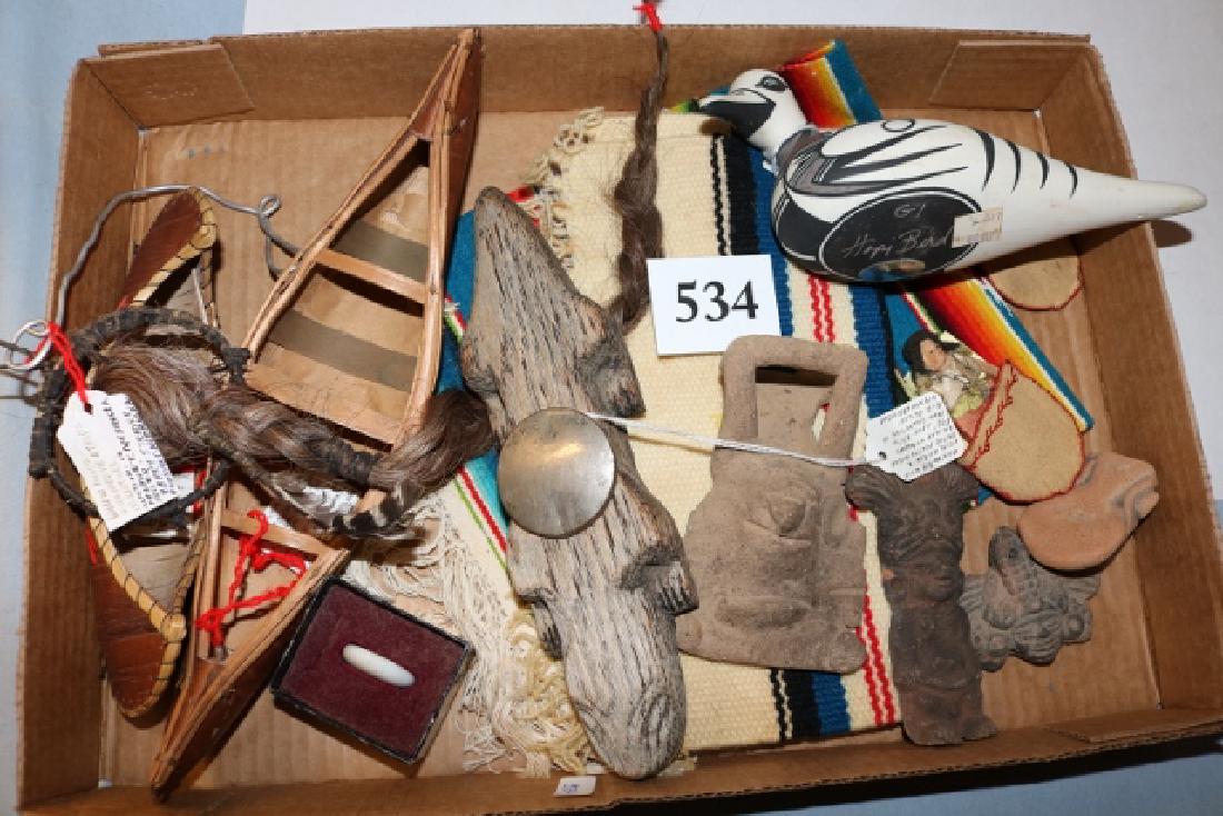 Box Lot: 2 Mats, 2 Birch Bark canoes: Box Lot: 2 Mats, 2 Birch Bark canoes, 4 Mexican Clay Heads, Wind Fetish, Wood Fetish Pottery Duck, 2 Doll Mailers – no shipping out of country