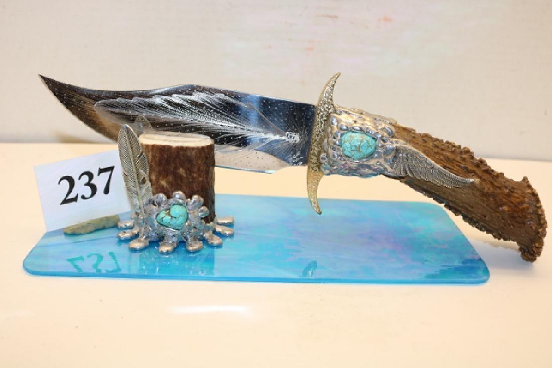 Elk Horn Silver Turq. Handled Bowie Knife: 12” Elk Horn Handled Silver Turq. Handled Bowie Knife, new signed 2017 David Palmer with stand and stained glass base