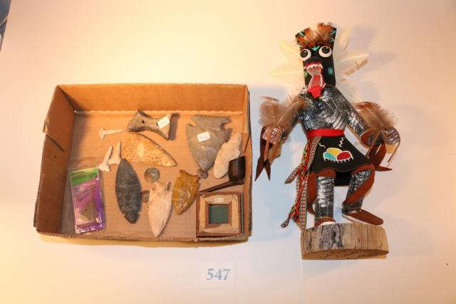 Box Lot of Broaches (5), Arrowheads etc.: Box Lot of Broaches (5) – 6 Arrowheads – 1 Gorget – 3 Drills – 1 Black Onyx Stone From Ring – 1 Large 14” Tall Kachina (Black Ogre) Signed Bakabe