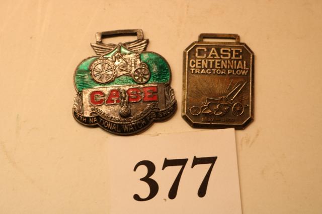 2 Watch Fobs: 2 Watch Fobs – Enamel International Watch Fob Association and Case Centennial Tractor Plow