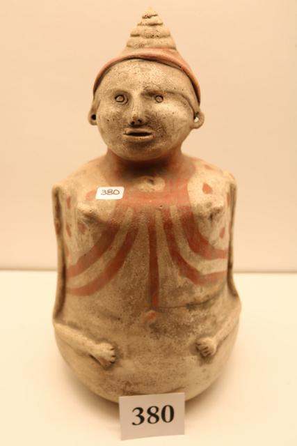 Caddo Human Effigy Water Bottle: 11 ½” Caddo Human Effigy Water Bottle Red on Buff – Hair Knot Pierced Ears – Ex. Robert Johnson Collection