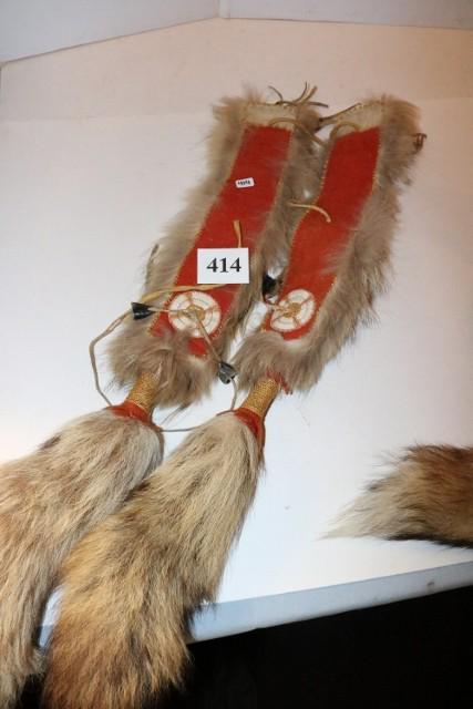 Pair of Coyote Hair Ties: Pair of Coyote Hair Ties, trade wool backing, with quilled rosettes and slat decoration