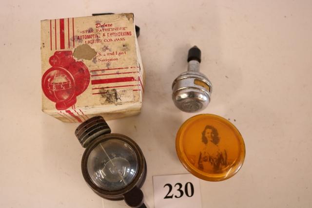 Star Pathfinder Liquid Compass: Star Pathfinder Liquid Compass, Box has wear and tearing, the compass points West, Steering Wheel Knob, and a AC Speedometer that is hard to read numbers