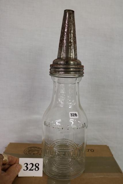 1 quart Huffman motor oil bottle: 1 quart Huffman motor oil bottle with metal spout some surface rust on spout.