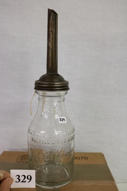 1 quart Jay B Rhodes C.O. motor oil bottle: 1 quart Jay B Rhodes C.O. motor oil bottle with metal spout.