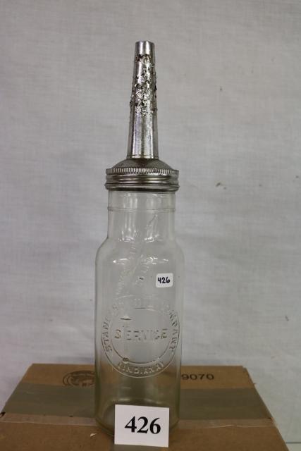 Standard Oil Company One Quart Oil Bottle: Standard Oil Company One Quart Oil Bottle, with no cap, Spout has Been Painted and is now chipping, 15” Tall