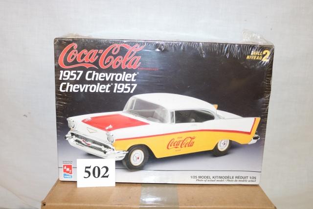 Coca-Cola 1957 Chevy 1/25 Scale Model: Coca-Cola 1957 Chevy 1/25 Scale Model Never Opened in perfect Condition, Box Size is 7 ½” Tall x 11” Wide