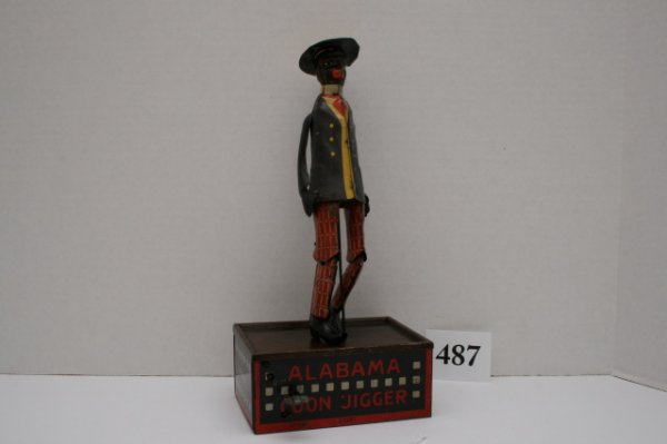 Strauss Wind Up Alabama Coon Jigger: Strauss Wind Up Alabama Coon Jigger excellent working condition.