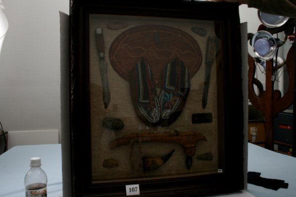 Five Flint arrowheads: 27" x 31" Great Antique Hand carved Walnut frame display of five Flint arrowheads, stone tool & slate gorget, two trade knives, Pr. Mohawk beaded Moccasins over engraved cedar matt bird design, small