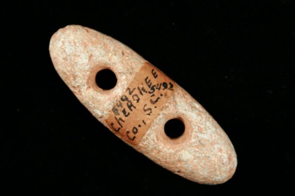 GORGET: GORGET, STEATTE, 2 ¾", CHEROKEE CO., SC., PICTURED OHIO ARCHAEOLOGIST VOL. 36, #4, BACK COVER (1986)