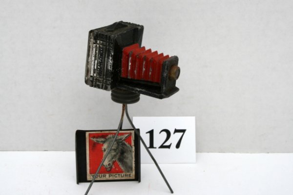 Camera on Tripod Candy Container: Camera on Tripod - No string or wooden bead bulb attached to metal ring - donkey picture
