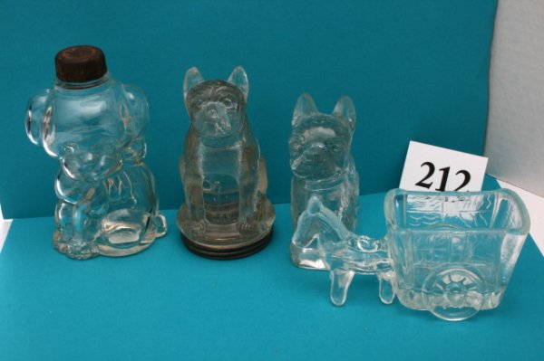 4 Misc. Candy Containers: n/pic (4pcs)Dog - "Bulldog - Oblong Base" - N/C Dog - "Bulldog - Round Base" - No paint - chipped ear - O/C Dog - "With Scarf" - Cologne with plastic cap Horse with Two Wheeled Cart - N/C