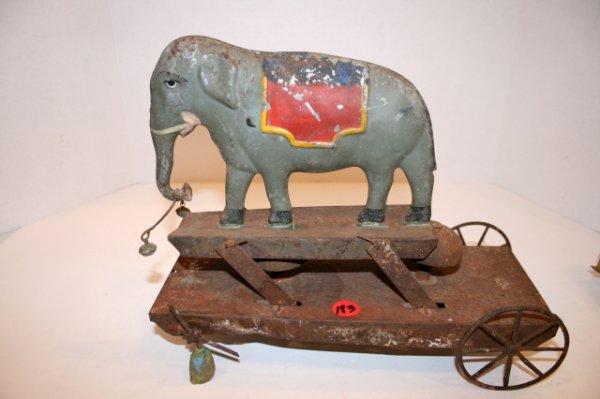 Fallows Jumbo on Platform: Fallows Jumbo on Elevated Platform American Tin Articulated Elephant Bell Ringer missing wheel, oxidation on platform