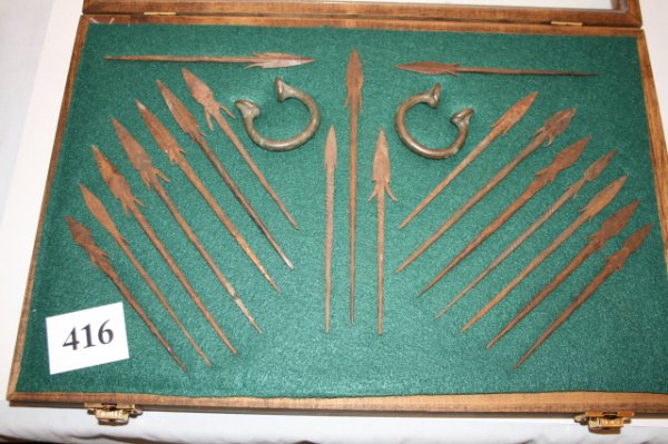 12 x 18 Frame Collection of 19 Early hand Forged R: 12 x 18 Frame Collection of 19 Early hand Forged Rat Tail Spear Points – plus 2 small brass bracelets