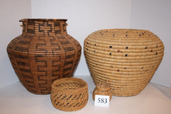 4 Indian Baskets: 4 Indian Baskets: 1 North West Coast, 1 damaged Apache Olla, 1 Pine Needle Basket, Makaw Basket – largest 11 3/4" x 11 1/4