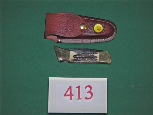 KNIFE: Customized Case Hammerhead folder complete with sheath features stag handles, file worked back spring, liners and blade
