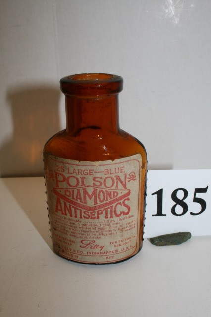 3 1/2" Amber Poison Bottle: 3 1/2" Amber Poison Bottle – Lilly Diamond Antiseptic with original label & embossed poison