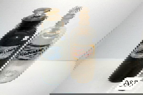 (2) 10" Apothecary Bottles: (2) 10" Apothecary Bottles – label under glass P. Carbolighi & AQ Rosae – original stoppers