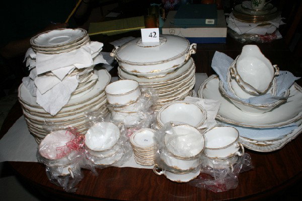 Haviland Limoges China Set: Set of Theodore Haviland Limoges China Set – (10) 5" Sauce Dishes, (12) Butter pats, (14) Cups & saucers, (12) 10" Dinner Plates, (12) 9" Luncheon Plates, 9" Covered Tureen, Gravy Boat, 10 1/2" Oblo