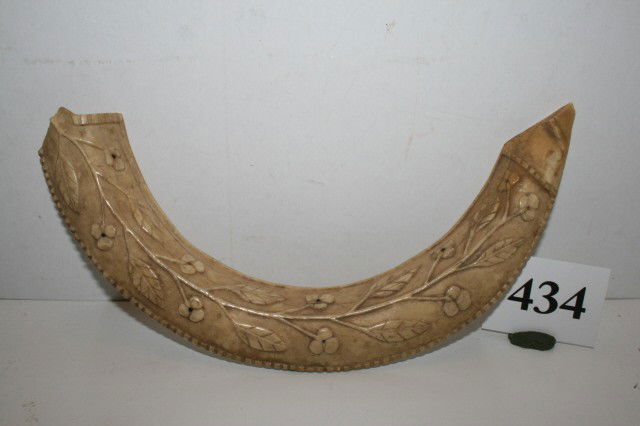 Antler or Rib Bone Gorget: 9 1/4" Antler or Rib Bone Gorget – with flower and vine carved design, small cut nails in center of flowers, small chip at one end – rare – Great Lake Region