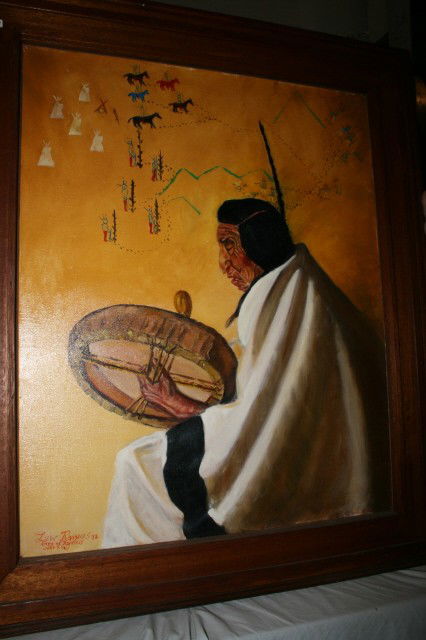 Oil on Canvas of Old Indian: 37 1/2" x 31 3/4" Framed Oil on Canvas of Old Indian Beating Drum by Lew Raines 1972