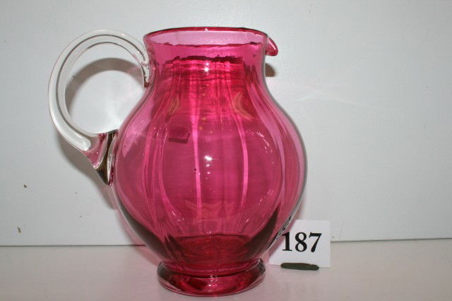 Blown Cranberry Pitcher: 7 1/2" Blown Cranberry Pitcher with crystal handle
